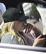 1458739912225_chloe_moretz_driving_with_her_phone_in_la_04.jpg