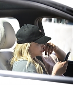 1458739933395_chloe_moretz_driving_with_her_phone_in_la_05.jpg
